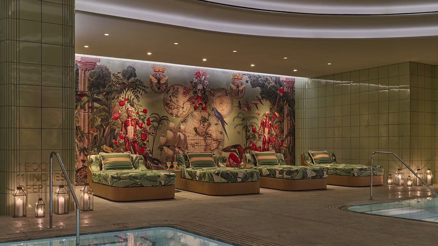 Luxury spa loungers beside an indoor pool