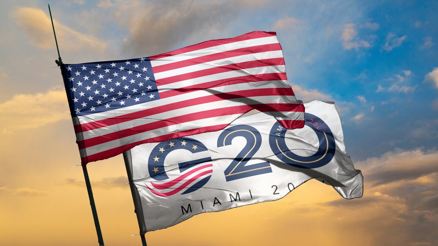 The United States flag and the G20 Miami 2026 flag